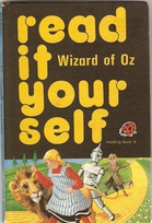 777 wizard of oz black yellow letters.jpg